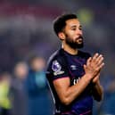 Andros Townsend applauds the fans during his time at Luton