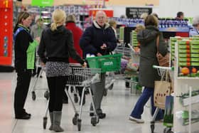 Shoppers in an Asda supermarket