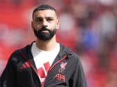 Mohammed Salah wearing a Liverpool tracksuit
