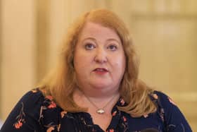 Naomi Long at a press conference in Belfast
