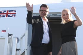 Prime Minister Andy Burnham and his wife Marie-France Van Heel board a plane at Stansted Airport ahead of attending the 81st United Nations General Assembly in New York