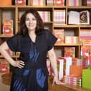 Nigella Lawson smiles at the camera during a book launch