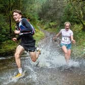 Runners making a splash in a previous Ron Skilton Memorial Half Marathon.