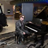 Freddie Mack sitting at the piano