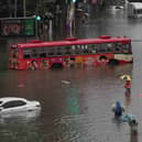 The streets are flooded after heavy rain in Bangkok,