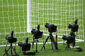 Remote cameras positioned behind the goal