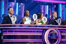 The Strictly judges holding up their scores