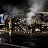 Multiple fire crews battled the blaze involving an abandoned trailer off the A41 near Newport.