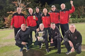 Woore’s winners with skipper Gary Beff holding the Jubilee Doubles trophy