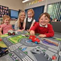 Love Your School visits: Buttington Trewern School, Welshpool. The Head is: Anna Griggs.   Reception area with Teacher: Ellie McGrath and pupils: Eviie 4, Delilah 4 and Harvey 4.