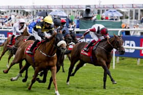 Air Force One under Clifford Lee wins the Portland at Doncaster