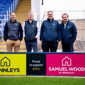 Mannleys Group directors (from left) Chris Mann, Aaron Manley, Andrew Cadwallader and Russell Griffin at Shrewsbury Town's stadium