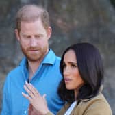Duke and Duchess of Sussex look serious
