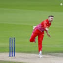 Mason Crane in bowling action