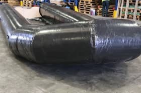 Inflatable boats due to be used by cross-Channel people smugglers which have been seized at East Midlands Airport. 