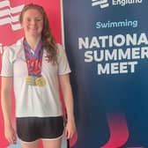 Eve Leleux with her three national medals