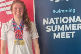 Eve Leleux with her three national medals