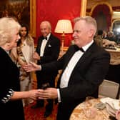Camilla is greeted by Lord Jeffrey Archer