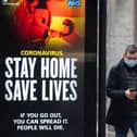 Coronavirus signage reading 'Stay home, save lives'