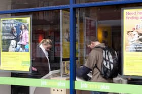 Young people inside a Jobcentre Plus in London