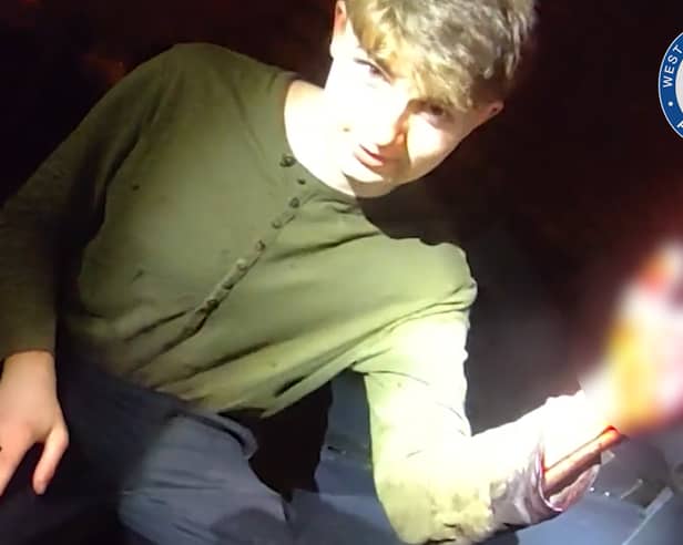 Screenshot taken from police body worn video of forensics student Benjamin Day as he was treated for a hand injury by officers in Dudley, 