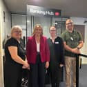 Helen Morgan (second left), Vik Puri (right) and the Wem Banking Hub team
