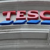 General view of a Tesco sign on the exterior of a store