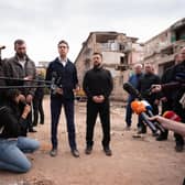 Foreign Secretary Ed Miliband and Ukrainian President Volodymyr Zelensky speak to the media during a visit to the site of a Russian missile strike which hit a residential area in Pryluky, northern Ukraine