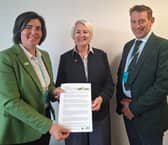 NFU Cymru President Abi Reader presents the union's planning paper to Cabinet Minister Sian Gwenllian MS, alongside NFU Cymru Rural Affairs Board Chair Gary Yeomans
