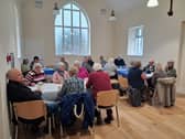 Residents enjoying a cup of tea and a chat in Gladestry Village Hall