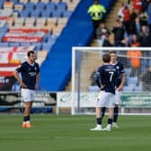 Dejected Shrewsbury Town players react after Sonny Cox of Exeter City scored a goal to make it 0-1.
