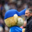 Derek McInnes watches from the Ibrox touchline