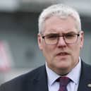 DUP leader Gavin Robinson speaks to journalists