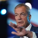 Nigel Farage answers questions at a press conference