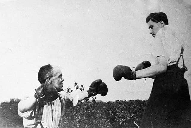 Sparring with his nephew, Cyril Bowyer.