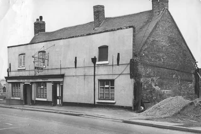 The pub pictured shortly before it made way for road widening.