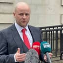 Loyalist activist Jamie Bryson speaks outside court