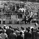 Walter Swinburn, 19, takes Shergar past the finishing post at Epsom to win the Derby by 10 lengths