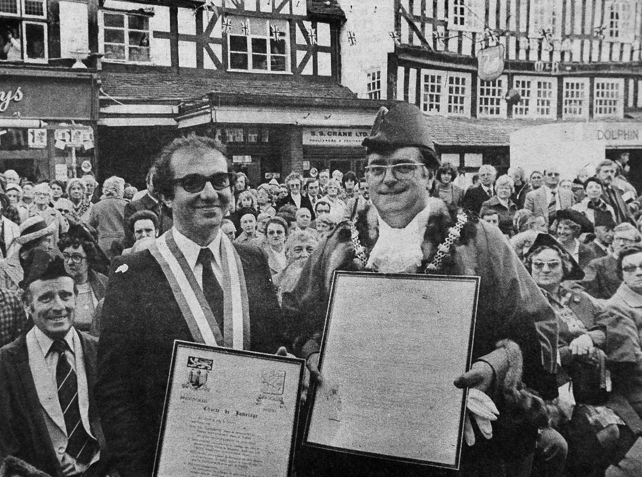 PICTURE FROM THE ARCHIVE: The Mayor of the French town of Thiers, Mr Maurice Adevah-Pœuf (left), and Bridgnorth Mayor Councillor Mike McCarthy pose proudly in Bridgnorth High Street on October 1, 1978. The pair held up the official scrolls commemorating the civic ceremony that formally united Bridgnorth and Thiers as twin towns. Were you in the High Street crowd to watch this historic moment in Bridgnorth's history?