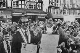 PICTURE FROM THE ARCHIVE: The Mayor of the French town of Thiers, Mr Maurice Adevah-Pœuf (left), and Bridgnorth Mayor Councillor Mike McCarthy pose proudly in Bridgnorth High Street on October 1, 1978. The pair held up the official scrolls commemorating the civic ceremony that formally united Bridgnorth and Thiers as twin towns. Were you in the High Street crowd to watch this historic moment in Bridgnorth's history?