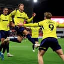 Middlesbrough’s Neto Borges, centre, celebrates his late winner against Stoke