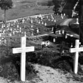 Simple wooden crosses on the graves of the German enemy at Bridgnorth Cemetery, seen here in 1941