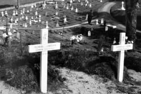 Simple wooden crosses on the graves of the German enemy at Bridgnorth Cemetery, seen here in 1941