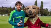 Fer Lopez (left) was presented with his Goal Hero of the Month award by Aleksandr, Compare the Market’s iconic meerkat.