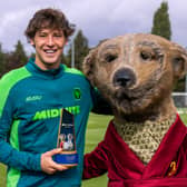 Fer Lopez (left) was presented with his Goal Hero of the Month award by Aleksandr, Compare the Market’s iconic meerkat.