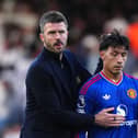 Manchester United manager Michael Carrick with Lisandro Martinez