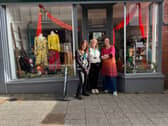 Shop staff and area manager Annette Wallis outside the temporary Whitchurch shop.
