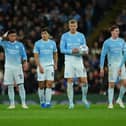 Manchester City players appear dejected