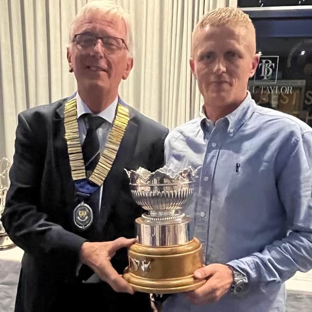 Merit magic for Perry Evans, seen with Andy Jones