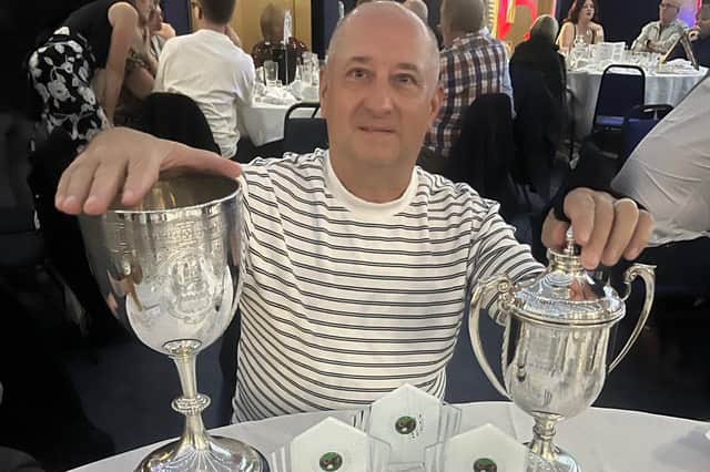 Trophies galore for Keith Wall of Monkmoor, winners of the Champagne Cup